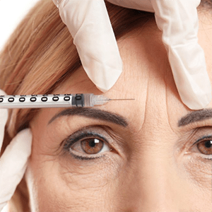 Middle aged woman having botox